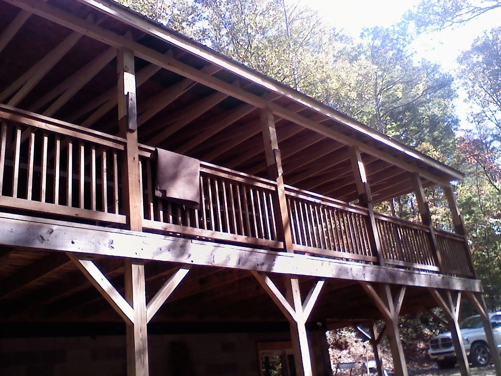 Timber framing under a new elevated porch and deck — Roof Leak Repair in Quaker Hill by Roofing Brothers